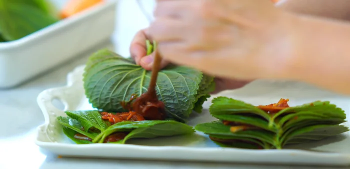 Alternatively, arrange the leaves side-by-side and apply the sauce between each leaf, working from top to bottom.