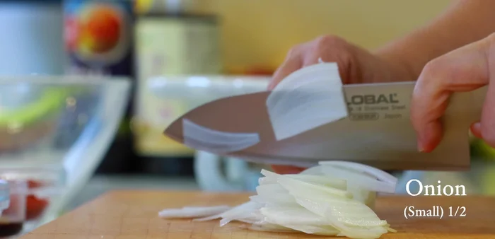 Thinly slice a small onion and julienne the carrot.