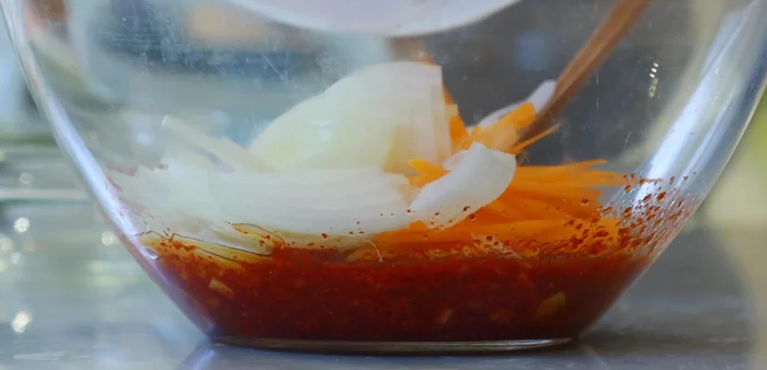 Add the prepared vegetables to the bowl and stir to combine.