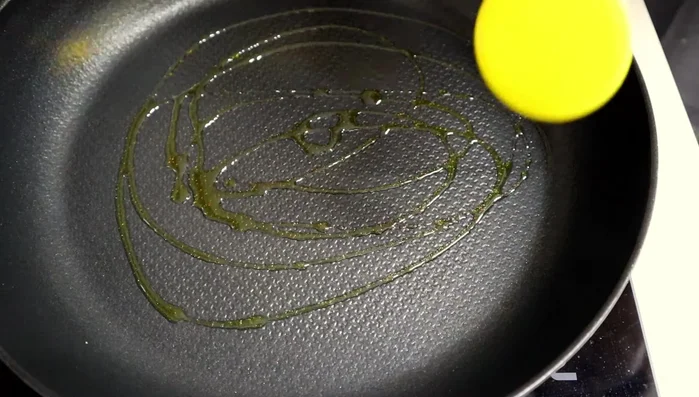 Heat a skillet with oil and cook the pancakes on low heat, turning occasionally until browned.
