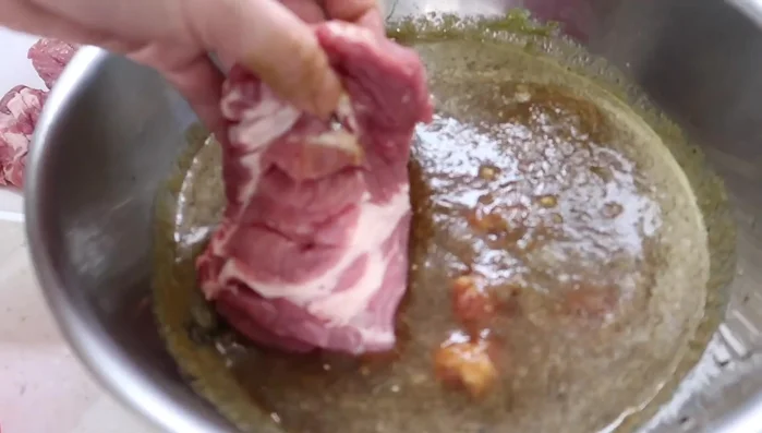 Marinate the pork: Place the pork in the marinade, ensuring it's submerged. Cover and refrigerate for at least 12 hours (24 hours is recommended).