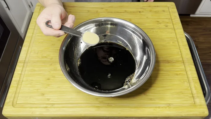 Prepare the marinade: In a bowl, whisk together 1 cup soy sauce, 1 cup water, 1 teaspoon garlic powder, 1 tablespoon ginger powder, 1 teaspoon black pepper, and 4 tablespoons white sugar (or brown sugar).