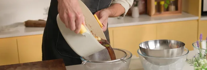Strain the marinade and cool it quickly by placing the bowl in a larger bowl filled with ice.