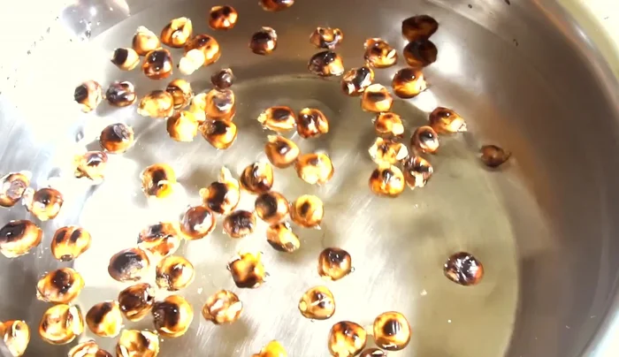 Bring the mixture to a boil, then simmer for 15 minutes. You can use whole or crushed kernels; crushed kernels create a stronger flavor.