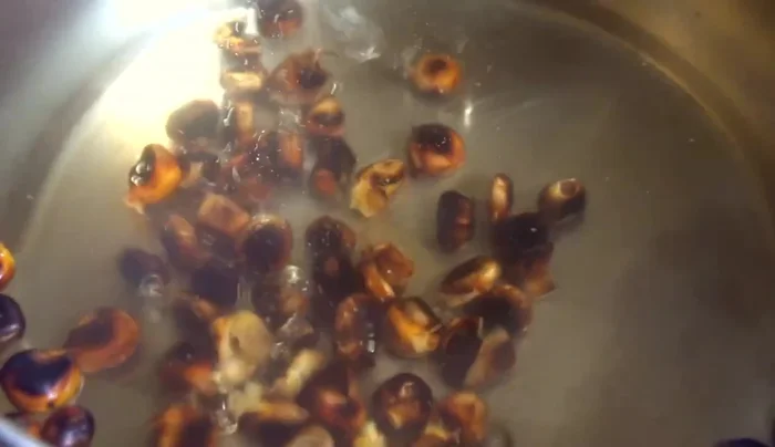 Check the tea's strength. Add more water if it's too strong, or more kernels if it's too weak and steep further.