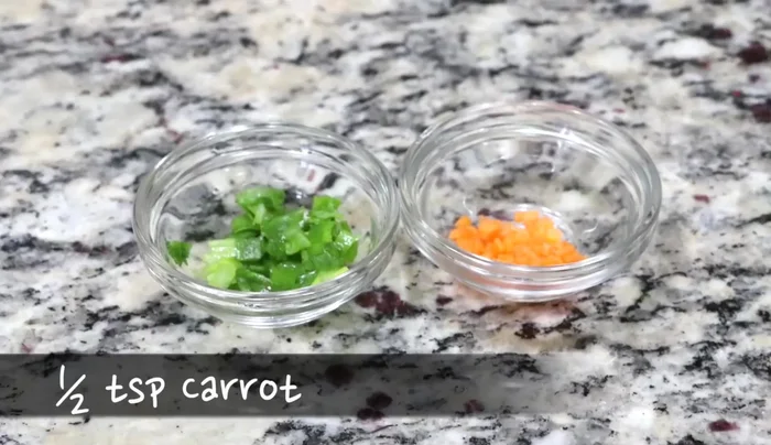 Finely chop green onion and carrot for garnish.