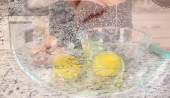 Prepare eggs: Break 6 large eggs into a bowl. Remove the white stringy part attached to the yolk if desired. Whisk eggs with salt and sugar until slightly foamy.