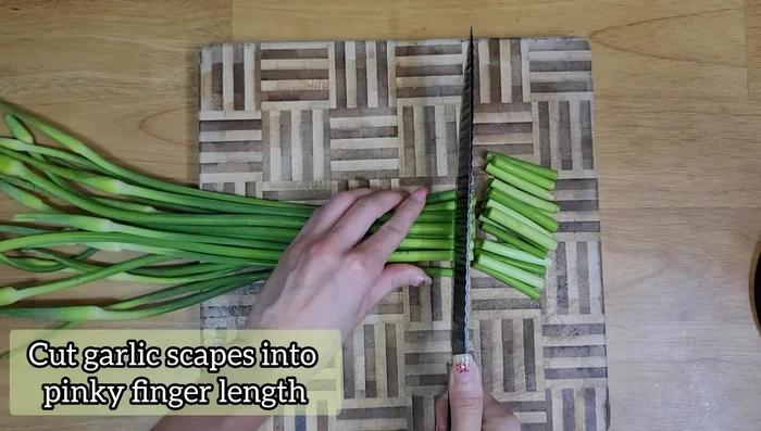 Cut garlic scapes into pinky finger length pieces (slightly longer is okay).