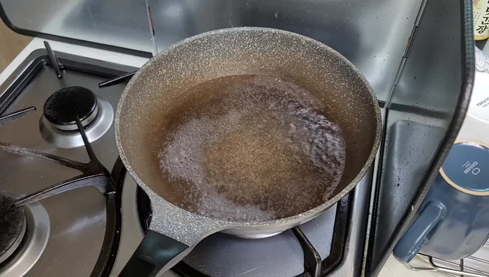 Blanch garlic scapes in boiling water for 2-3 minutes. Rinse with cold water.