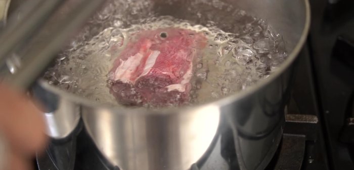 Flash blanch beef: Bring water to a boil. Add beef, boil for 5 minutes, then rinse under cold water to remove impurities.