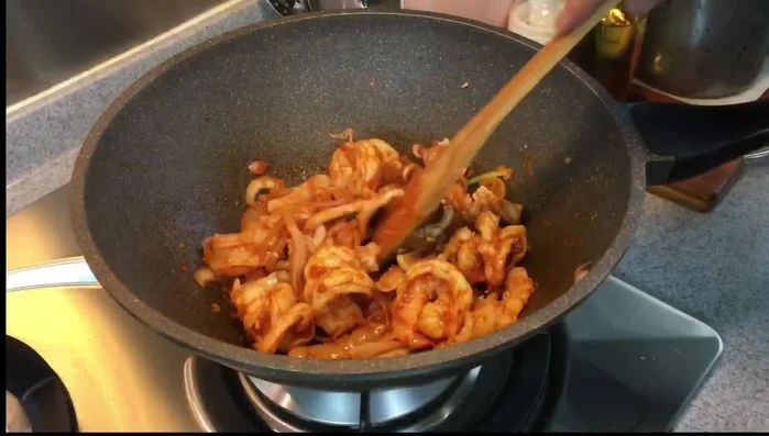 Add spring onions.