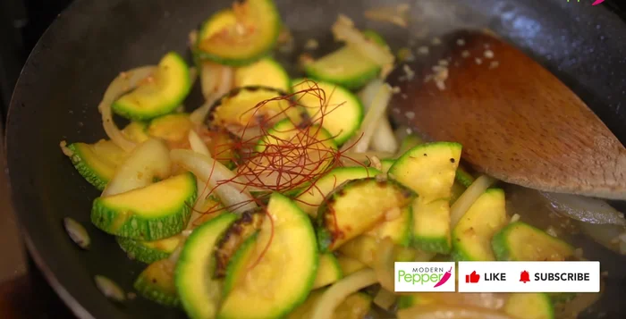 Right before removing from heat, add chili threads and mix.