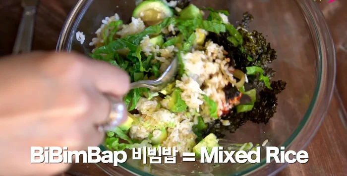 Drizzle with sesame oil and mix well.