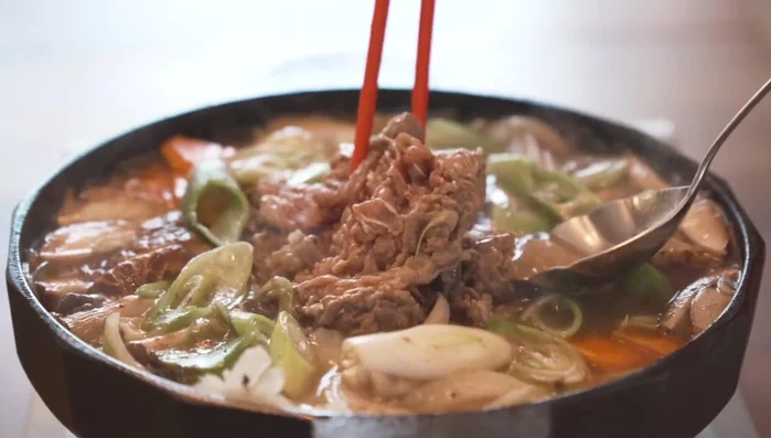 Simmer until the beef and vegetables are cooked through.