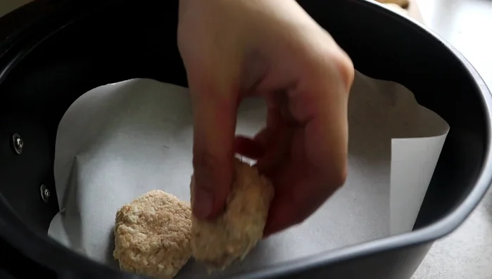 Cook the nuggets either fresh or frozen in an air fryer or oven until golden brown on all sides. (90.84)