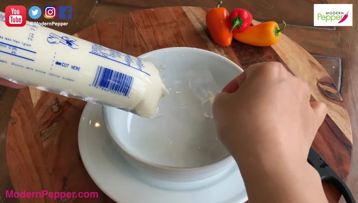 Prepare soft tofu: Cut the top, squeeze out excess water, and break into chunks. Wrap tightly in saran wrap and microwave for 60 seconds.
