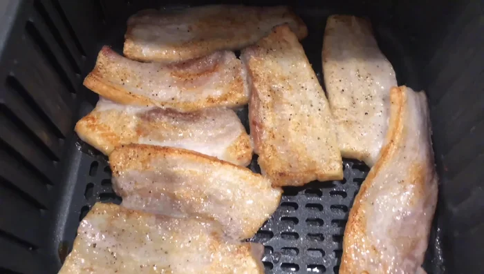 Cook pork belly in an air fryer until crispy.