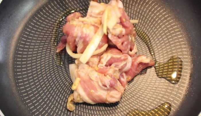 Add the seasoned pork to the pan and fry for 15-20 minutes, flipping as needed.