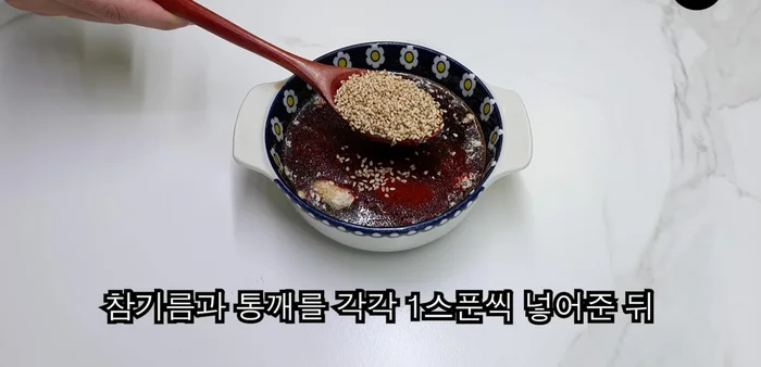 Make the sauce: Mix vinegar, sesame oil, and sesame seeds. Add salt to taste.