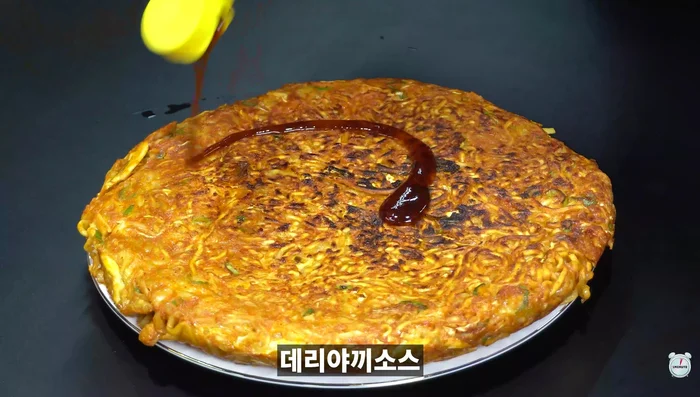 Spread a thin layer of proxy aki sauce on top.