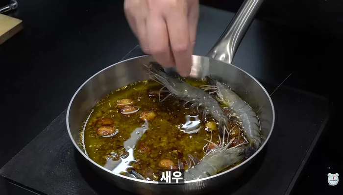 Add a generous amount of sauce to a pan.