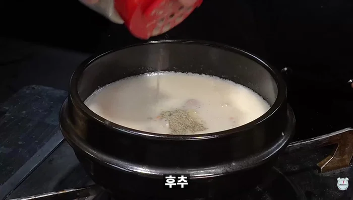 Add minced garlic, shrimp paste, pepper, and (optional) chalsundae.