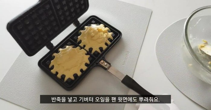 Remove the waffles from the waffle iron and let them cool slightly before serving.