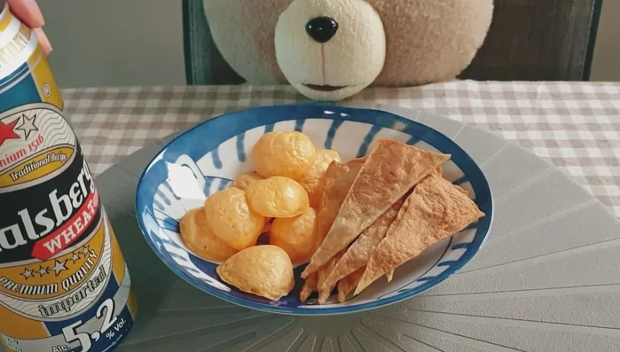 Microwave the fish cake to make fish cake chips. (Specific instructions are missing from the transcript)
