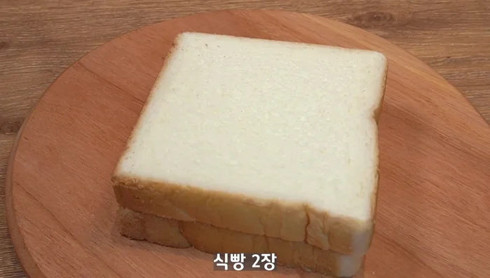 Spread the garlic butter mixture evenly onto bread slices.
