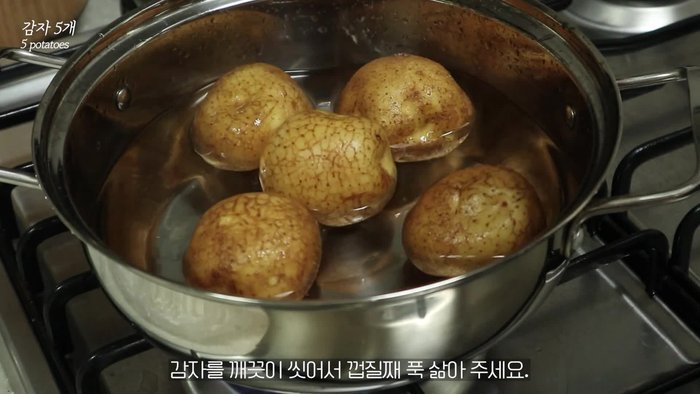 Wash potatoes thoroughly and boil them with their skins on.