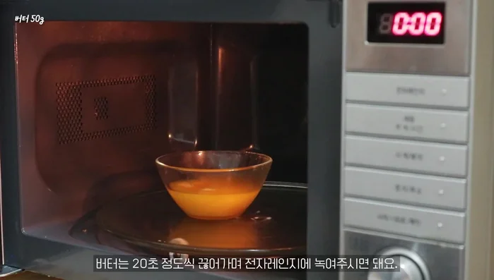 Add melted butter and mix well.