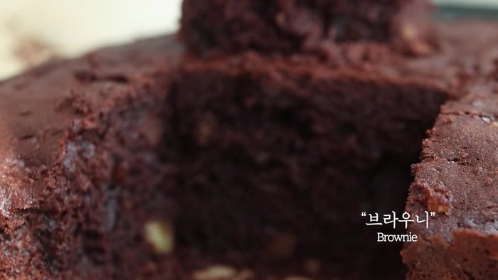Pour batter into a prepared baking pan.