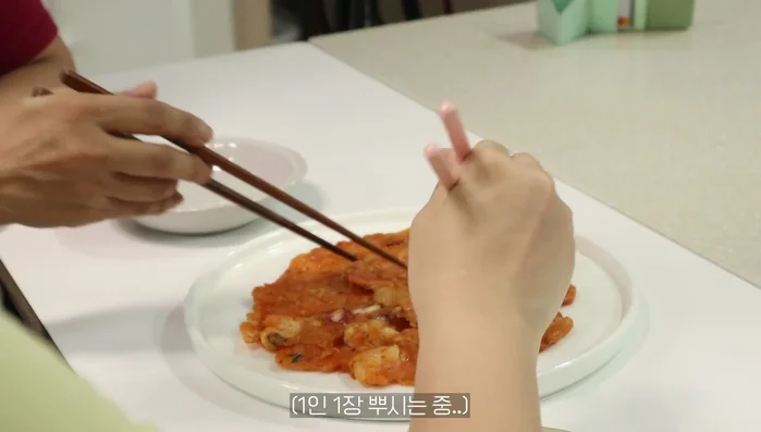 Serve and enjoy your crispy kimchi jeon!