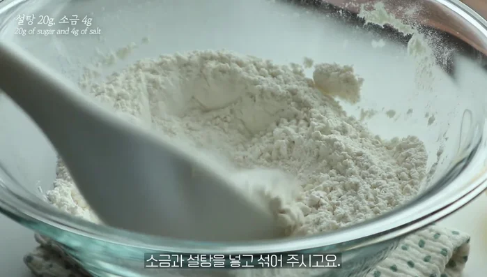 Add salt and sugar and mix.