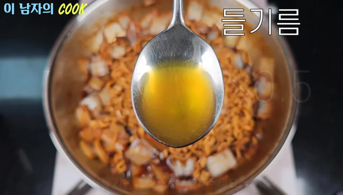 Add half a spoon of sesame oil and mix well.