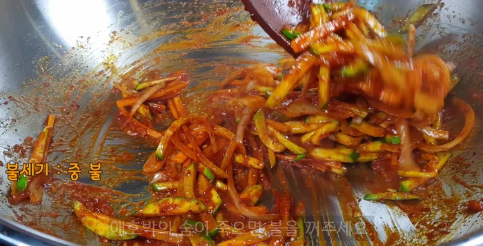 Stir-fry until the vegetables are tender but still slightly crisp. Turn off the heat.