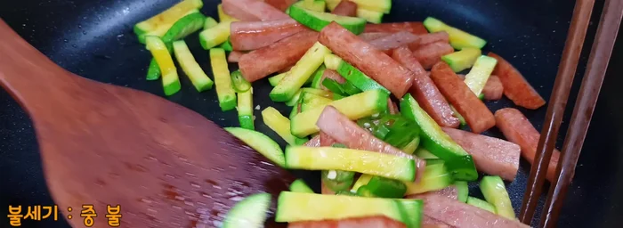 Add the thinly sliced Cheongyang pepper (if using) and stir-fry for another 30 seconds.