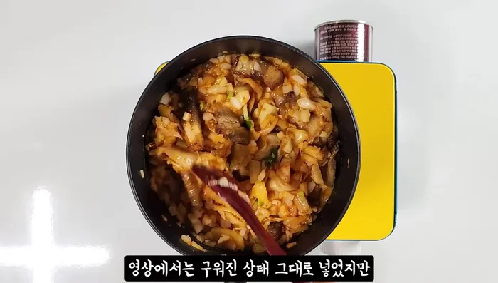 Add remaining ingredients: Add the chopped onion, the remaining pork belly, red pepper powder, water, soy sauce, sugar, oyster sauce, and minced garlic.