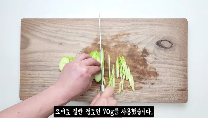 Prepare vegetables: Cut onion, cucumber, and carrots into bite-sized pieces. Add other vegetables like lettuce, cabbage, or Cheongyang peppers as desired.