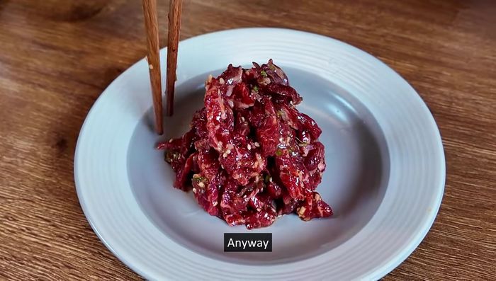 Serve (optional): Traditionally, yukhoe is served with an egg yolk and thinly sliced Asian pear. You can also add wasabi.