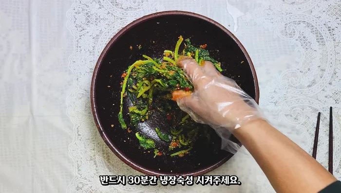 Add a tablespoon of sesame oil and mix again. Refrigerate for 30 minutes to allow flavors to meld.