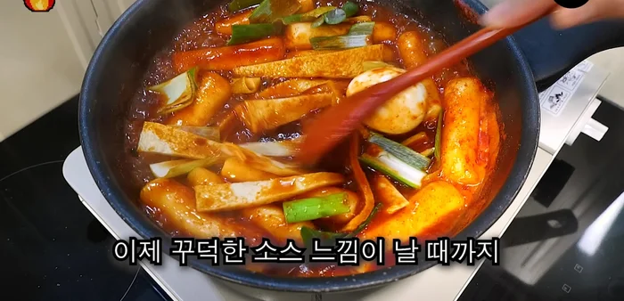 Stir-fry until the sauce thickens.