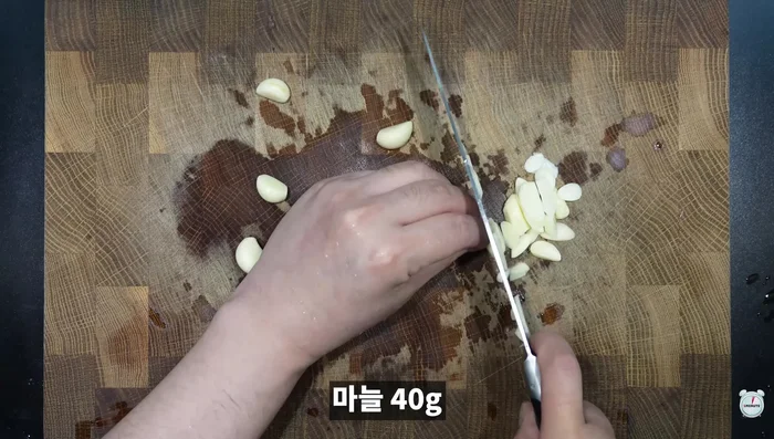 Add sliced garlic and butter; stir-fry until garlic is golden brown.