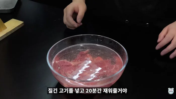 After 20 minutes, thoroughly wash the meat under running water to remove the baking soda smell.