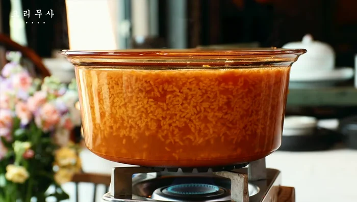 Strain the mixture through cheesecloth and squeeze out the liquid. Add pumpkin syrup (optional) for extra sweetness.