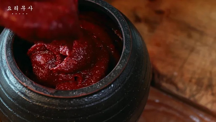 Place the finished gochujang in jars, and let age.