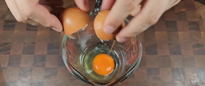 Crack and break four eggs.
