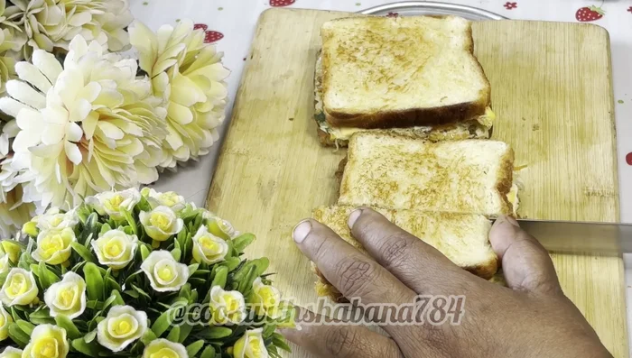 Cut the sandwich in half and serve (357.84).