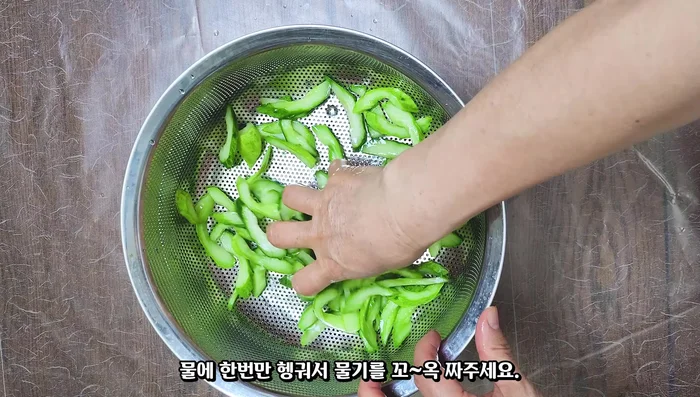Rinse the marinated cucumbers and drain thoroughly.