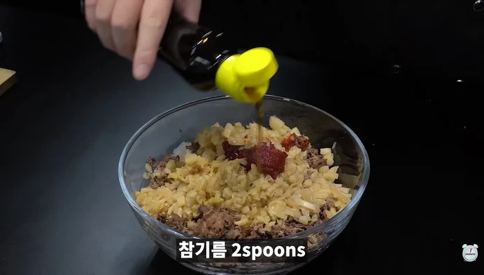 Bulgogi Rice Ball: Mix bore rice, grilled bulgogi, kimchi, gochujang, sesame oil, and sesame seeds. Shape into rice balls using a mold. Bake in an air fryer at 180 degrees for 10 minutes.